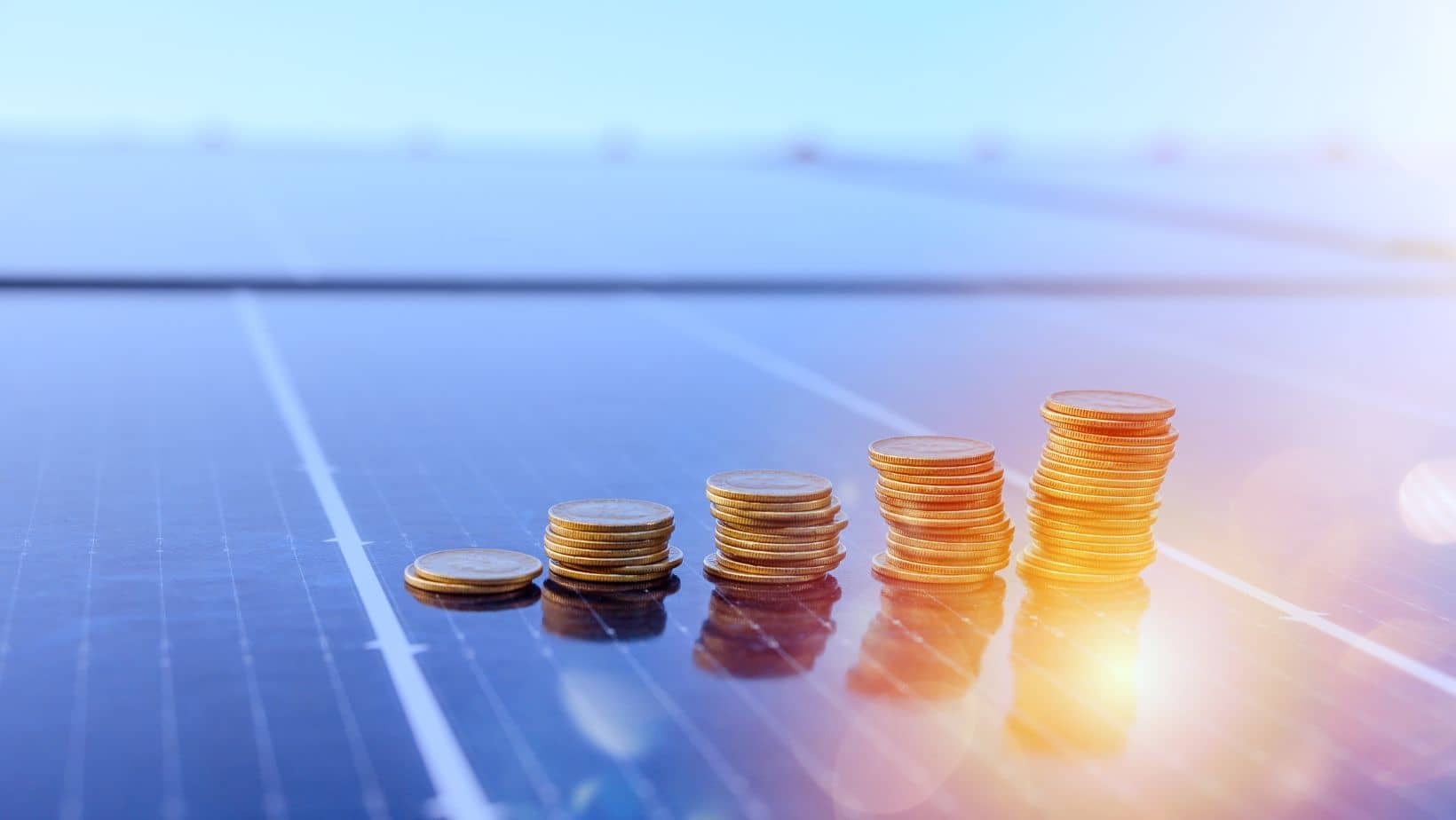 coins on solar panel